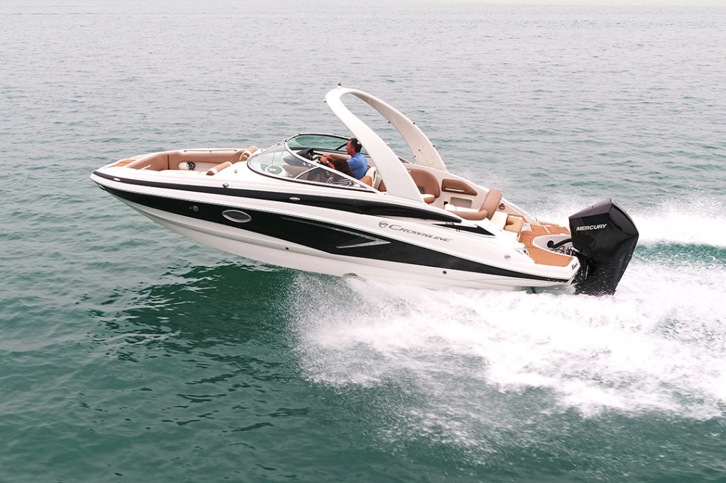 Smaller, fast motorboat cutting across the water