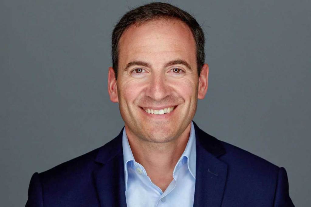 Headshot, man in a suit