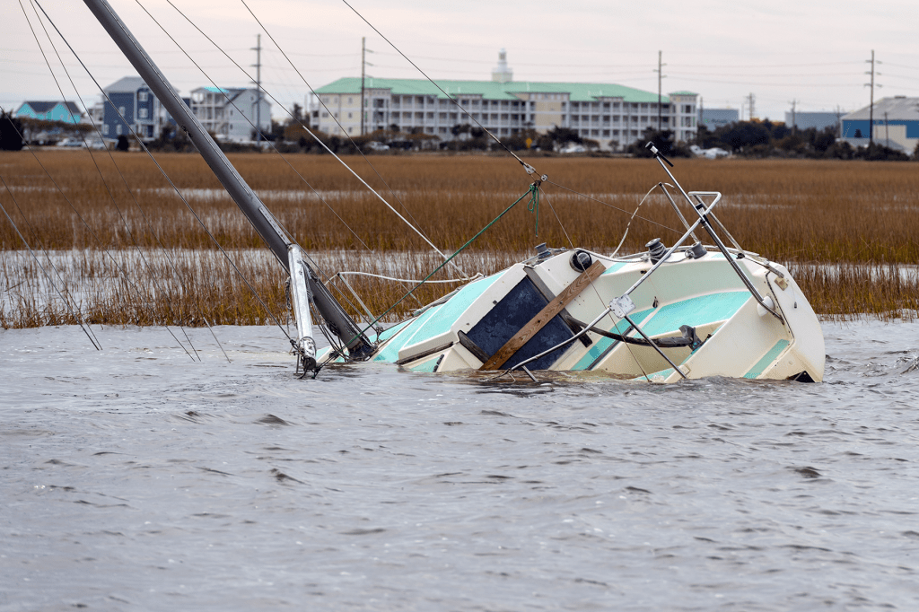 sailboat sinking into the water
