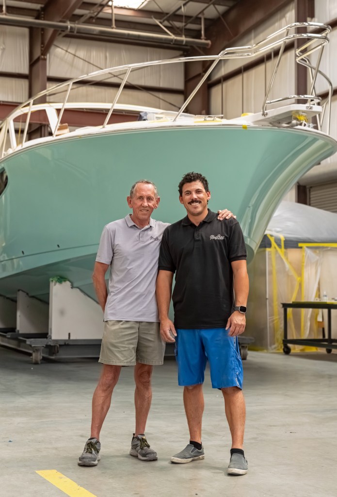 “It ain’t easy being in business with your kid,” Mike Howarth says, yet by any measure the father-and-son boatbuilding operation is a wild success. PHOTO COURTESY MAG BAY