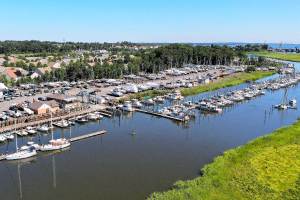 Birds eye view of a boat marina on a sunny day