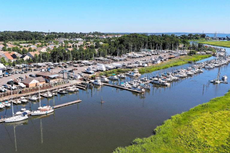 Birds eye view of a boat marina on a sunny day