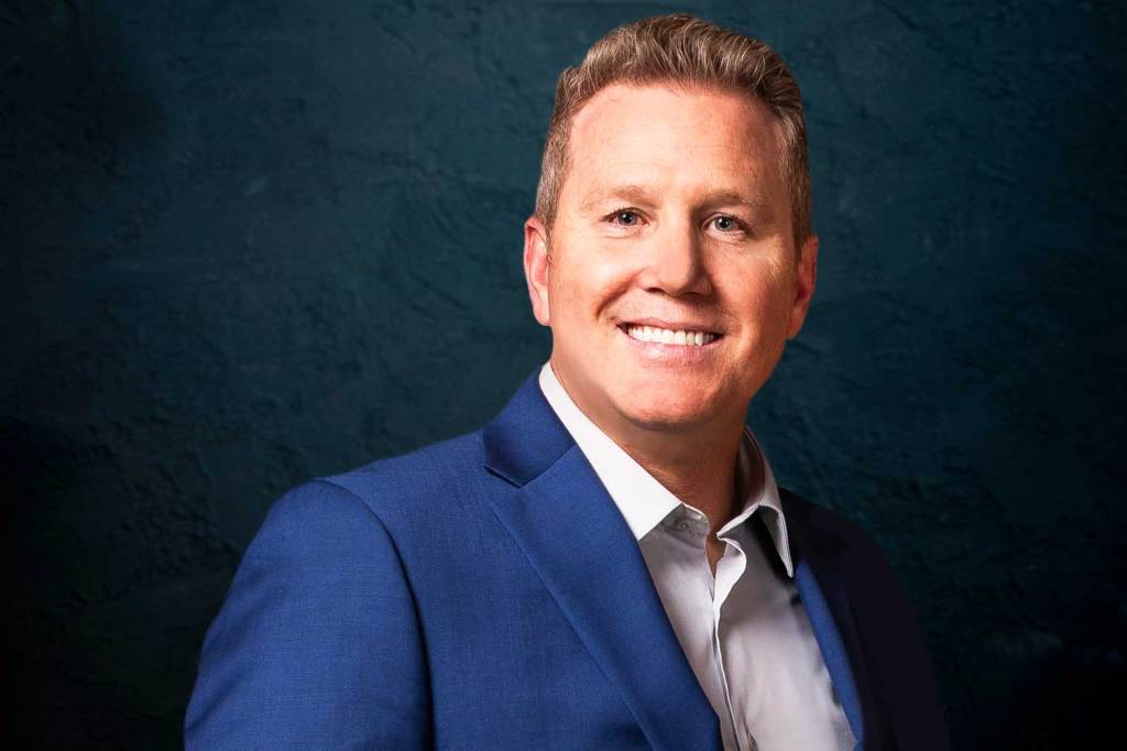 Business man smiling at the camera