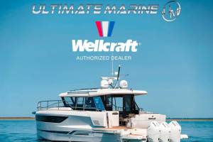 A motorboat in the water with the wellcraft comapny logo PHOTO COURTESY ULTIMATE MARINE