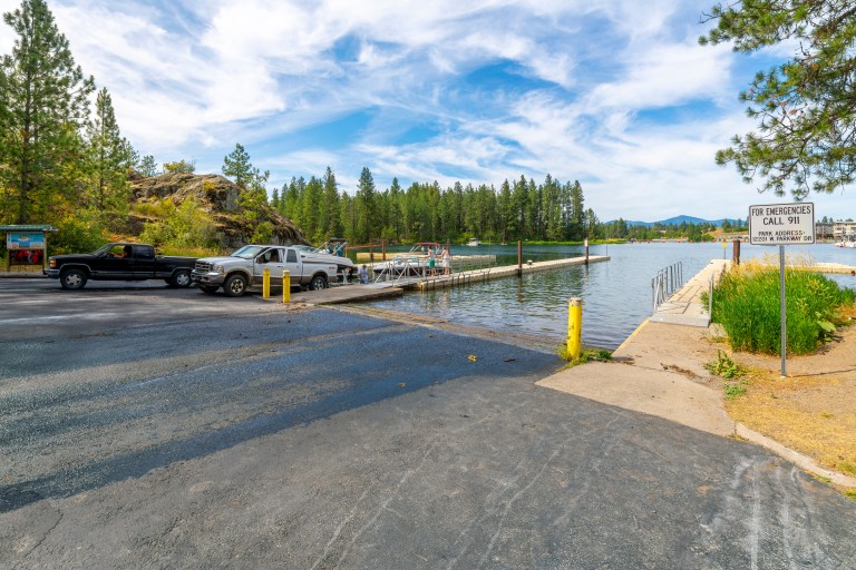 Trucks with trailers lower boats into the Spokane River from the boat ramp launch at Q’Emiln Park in the rural town of Post Falls, a suburb of the Coeur d’Alene Idaho region of North Idaho. The Sport Fish Restoration and Boating Trust Fund supports ramp maintenance and many other infrastructure projects. PHOTO: KIRK FISHER - STOCK.ADOBE.COM