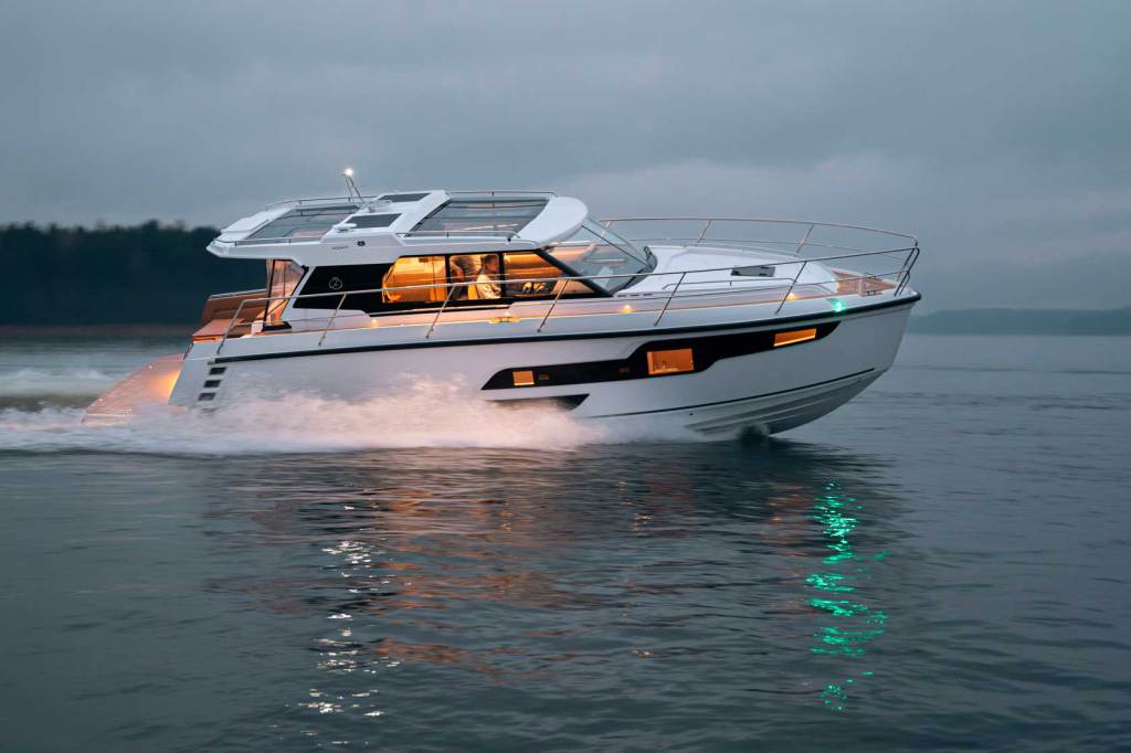 Fast looking motorboat a dusk on the water