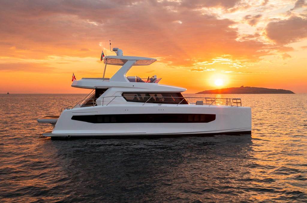 Big motoe cruiser on the water at sunset